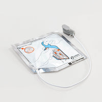 A white and silver square foil package containing adult electrodes for the Powerheart G5 defibrillator