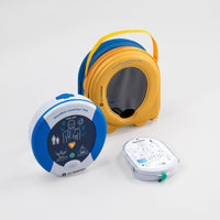 A blue and gray HeartSine 350P AED standing next to its yellow softshell carry case