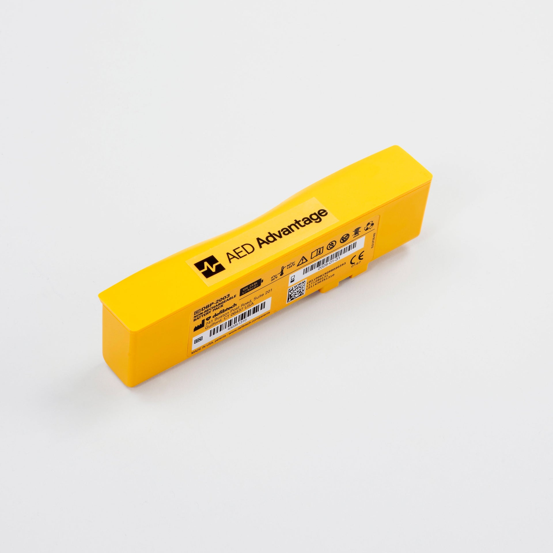 A small yellow rectangular Defibtech Lifeline VIEW AED battery pack